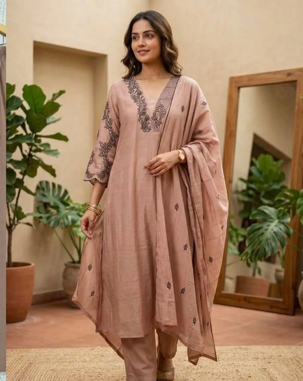 Dusty rose Mul Chanderi suit with dark floral detailing at the neckline and sleeves, matching trousers and dupatta