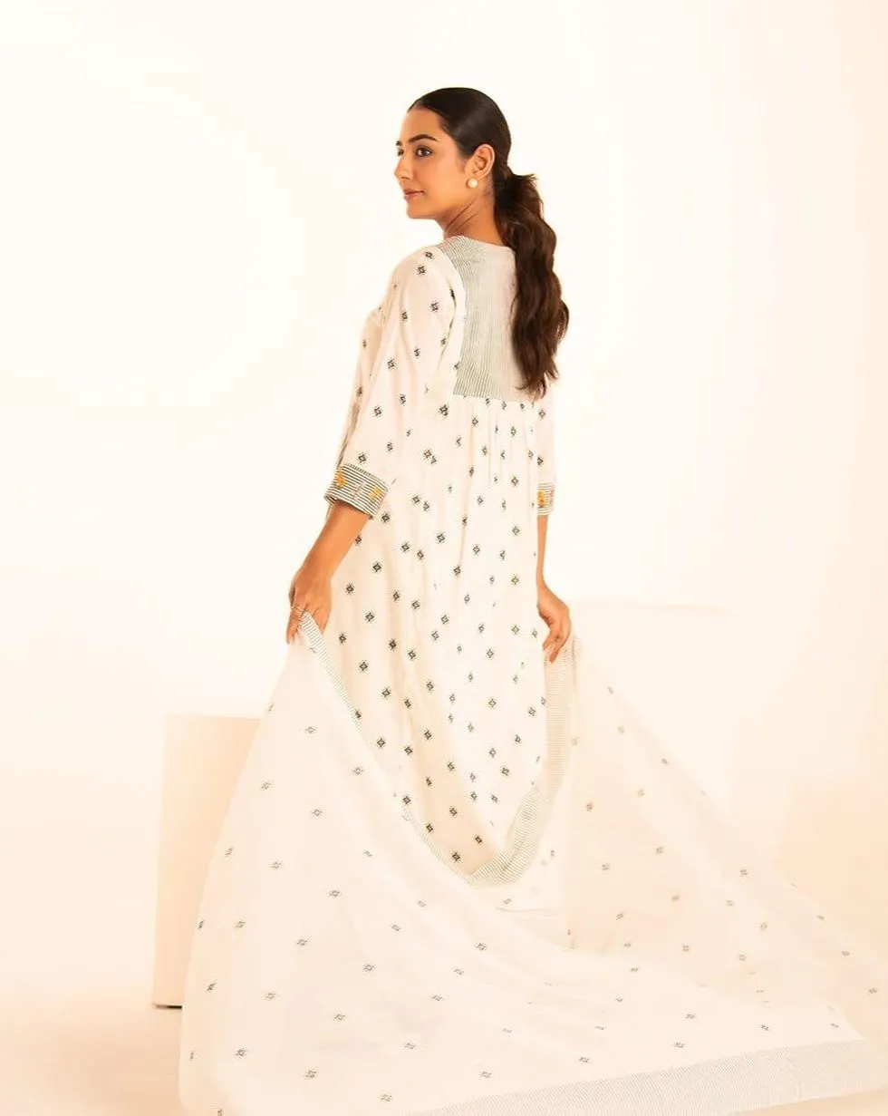 Ivory cotton suit set with black motif print and floral striped panels — Back view