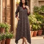 Black Medallion printed modal silk dress with three-quarter sleeves and an asymmetric hem