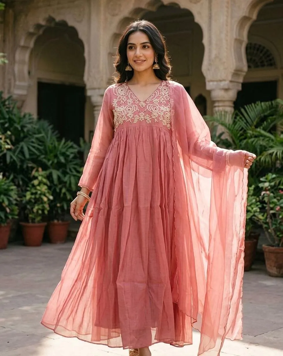 Rose pink Banarasi Mul Chanderi Anarkali suit with ornate light floral yoke, matching trousers and sheer dupatta