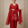 Ruby red Banarasi Mul Chanderi suit with light floral detailing, wide-leg trousers and sheer dotted dupatta