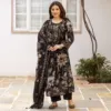 Black floral Mul Chanderi suit with mirror detail yoke, tassels, black trousers and matching floral dupatta