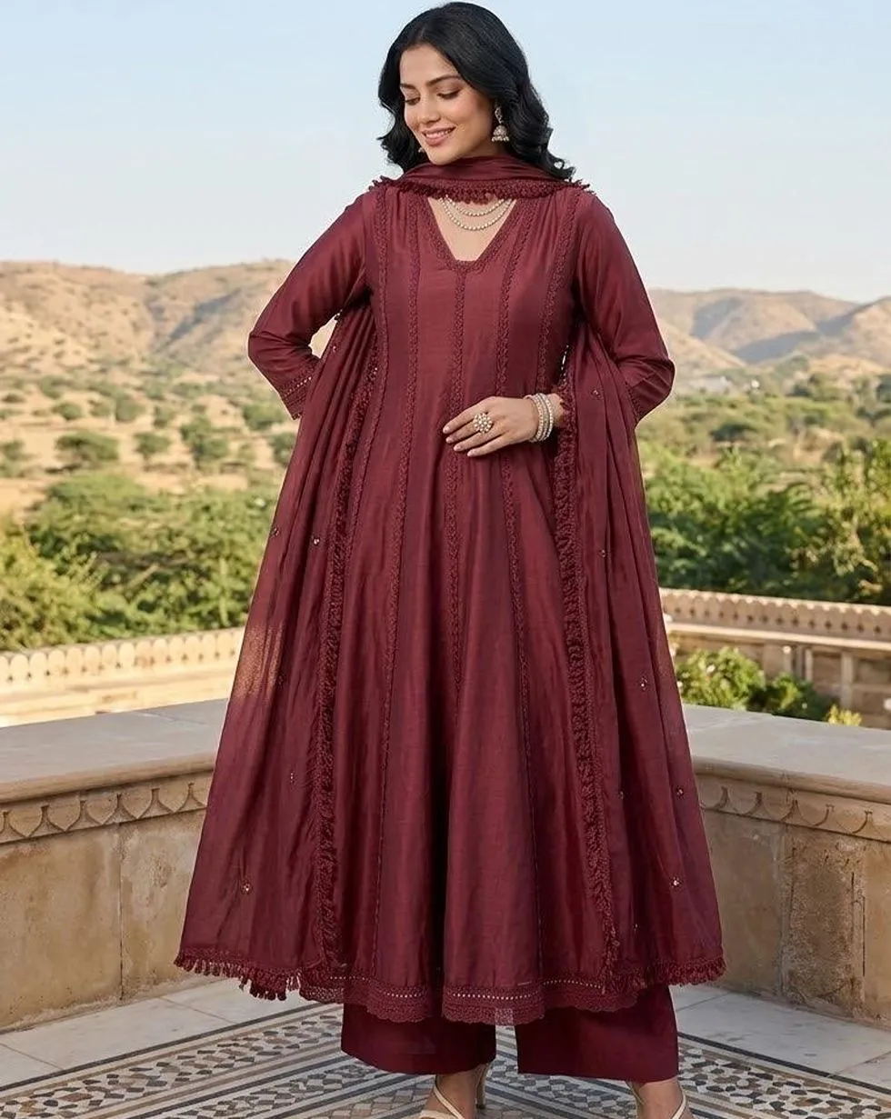 Burgundy Mul Chanderi Anarkali suit with tonal lace panels, matching trousers and lace-trimmed dupatta