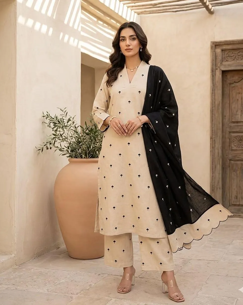 Ivory cotton kurta and trousers with small black motifs and a black dupatta with scalloped ivory border - view 2