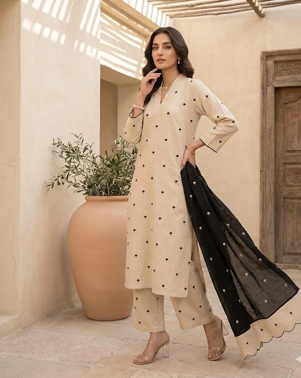 Ivory cotton kurta and trousers with small black motifs and a black dupatta with scalloped ivory border - view 3