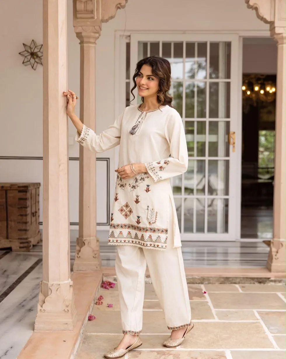 Ivory cotton co-ord set with floral and geometric embroidery, tassel neckline and matching trousers