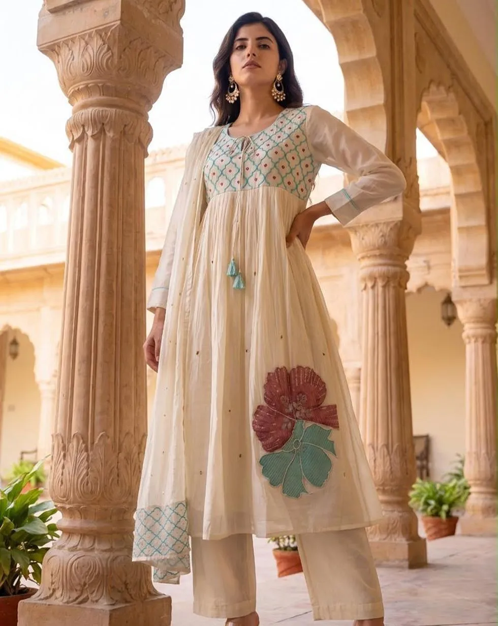 Ivory Mul Chanderi Anarkali suit with aqua geometric yoke, floral detailing and matching dupatta