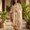 Ivory cotton suit set with rust paisley motifs, decorative neckline, lace trims and matching printed dupatta